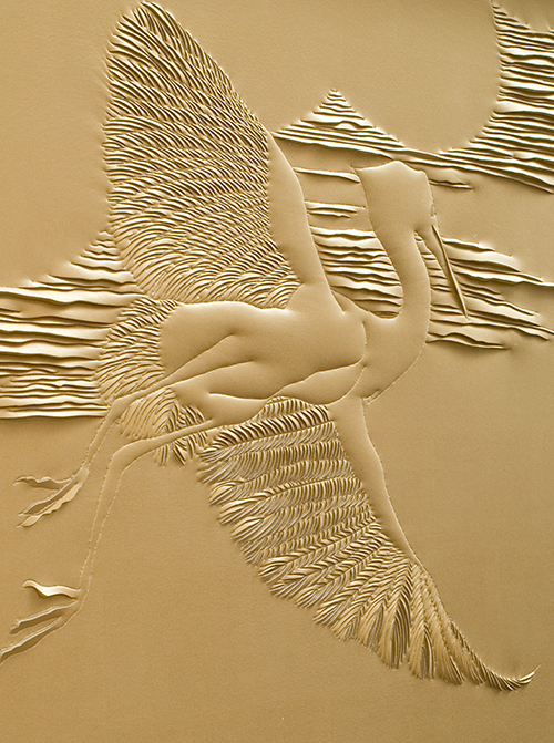 Detail of hand-sculpted gold faux suede artwork by Helen Amy Murray featuring cranes and clouds in a gold wooden frame
