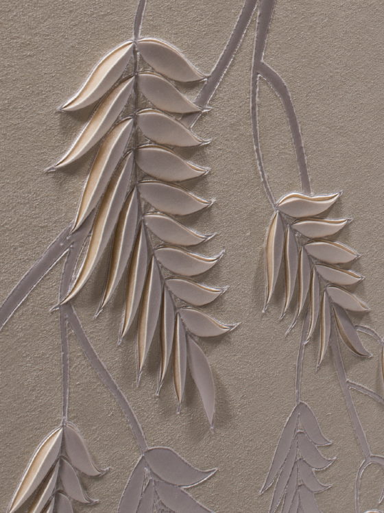 Detail of hand-sculpted white faux suede artwork by Helen Amy Murray with fern design with white silk crepe satin appliqué