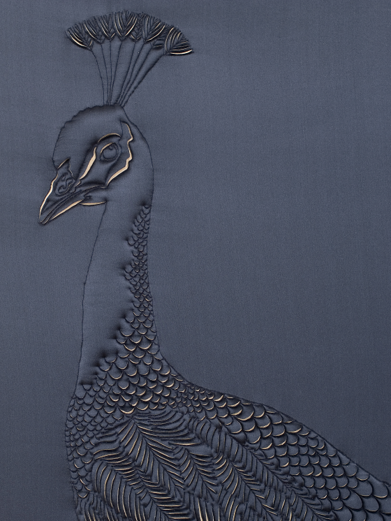 Artwork showing a detail of Peacock's head, hand-sculpted in navy blue and gold silk crepe satin and douppion silk appliqué