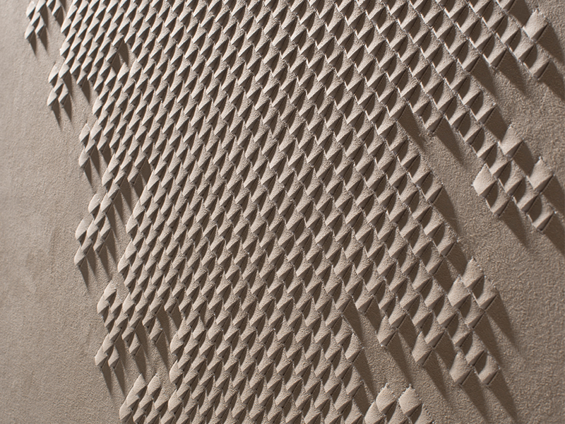 Detail from the side of Pixelated artwork by Helen Amy Murray, hand-sculpted in white faux suede
