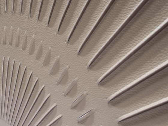 Detail of Radial artwork by Helen Amy Murray, hand-sculpted in taupe faux leather