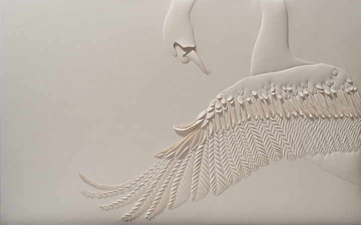 Hand-sculpted artwork by Helen Amy Murray of a swan with a bowed head in a cream colour faux suede
